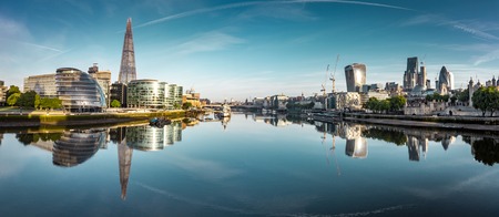 Banks of river Thames in London after sunriseの写真素材