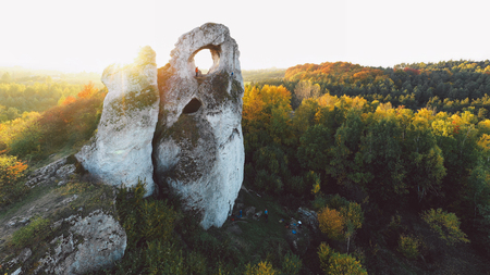 A panoramic view of the unique Okiennik rock in Poland with a large natural windowの写真素材