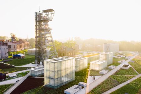 KATOWICE, POLAND - JUNE 08, 2019: The modern buildings of Silesian Museum accompanied by a shaft of the former coal mine "Katowice", now adapted as an observation tower.のeditorial素材