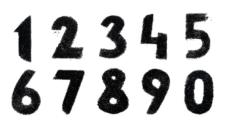 Black numbers made from beads on white background. Isolated.の写真素材