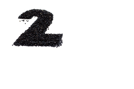 Black number made from beads on white background. Isolated.の写真素材