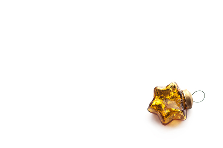 Christmas toy isolated on white. Vintage glass star.の写真素材