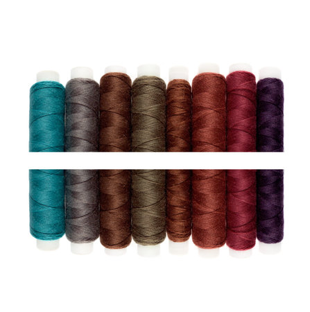 Multicolor sewing threads isolated on white background