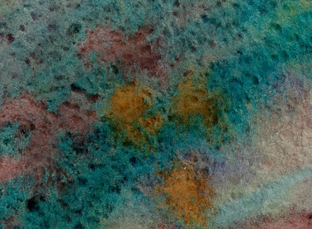 Abstract watercolor background in vivid autumn colors with paper texture