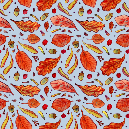 Watercolor autumn leaves, berries, acorns and tree seeds isolated on blue background, seamless patternの写真素材