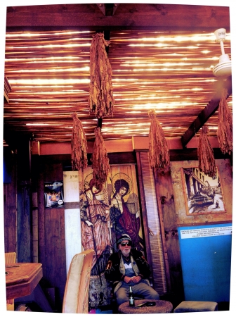 An old man in a little Cuban restaurant, Cape Town の素材