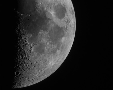 Detailed and impactfull quadrant of The Moon against the blackness of spaceの写真素材