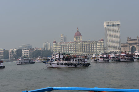 Hotel Taj & Gate way of India looking beautiful from the sea & view of boats parking.