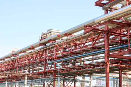 Pipeline trestle with iron rusty pipes for pumping liquid, condensate, steam with outlets and drains...