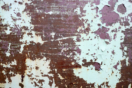 Texture of rusty two-color reddish and green old shabby oxidized metal, iron with bulbted peeling and green paint and patterns, background.の写真素材