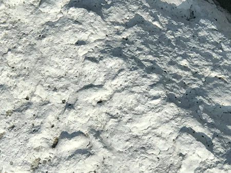 Gray surface of the moon with craters and pits, texture, background.