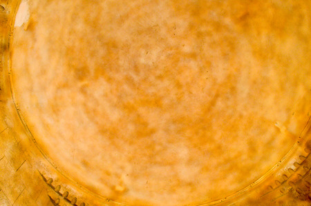 The texture of the dome on the ceiling is yellow concrete cement cement round rough with irregularities the old ancient convex. The background.の写真素材