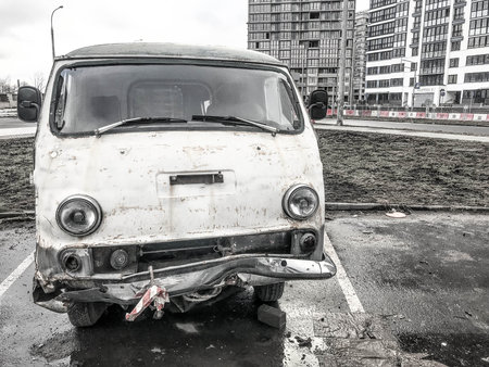 Old retro vintage hipster rusty oxidized metal round car minibus for hippies from the 60s, 70s, 80s, 90s, 2000s.の写真素材