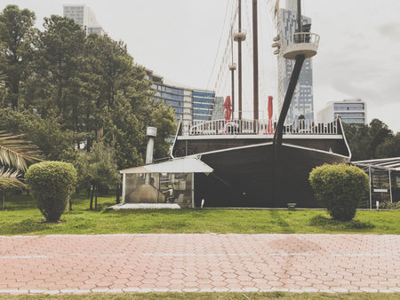 Unusual interesting restaurant in the form of an old sailing ship in the park in the middle of the...