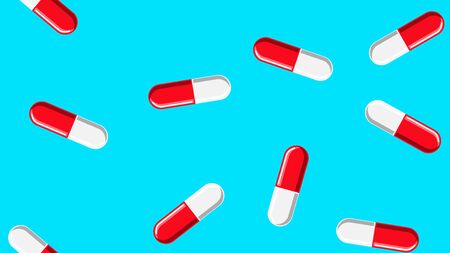 Seamless pattern texture of red oval white and red medical pharmaceutical pills capsules with medicine, drugs, vitamins on a blue background. Vector illustration.のイラスト素材