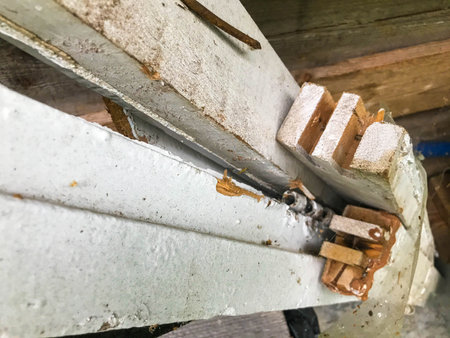boards painted white are stacked vertically. thin bars for building a house. material for the...