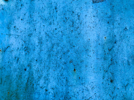 texture in blue. bright, matte surface. there is a patch on the texture, old texture with damaged paint. rusty texture, damage, rust on the background.の写真素材