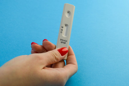 Doctor show rapid laboratory COVID-19 test for diagnosis new Corona virus infection (novel corona...