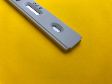 medical procedures. Test on a bright yellow background. new home self-diagnosis kit. medical...