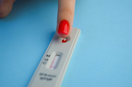 test for on an orange background. on a matte background, a sensitive strip for , a lancet, a...