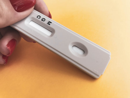 test for on an orange background. on a matte background, a sensitive strip for , a lancet, a...
