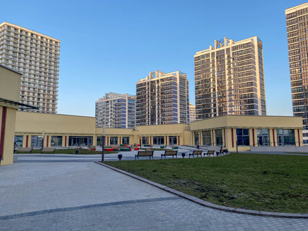 A new small shopping center within walking distance with shops and public spaces in a new microdistrict of a large city of the megalopolis.のeditorial素材