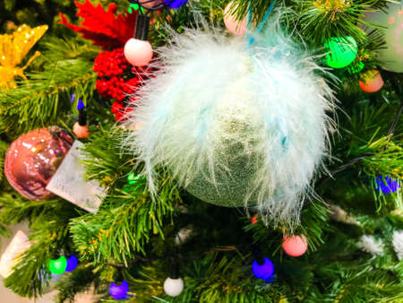 Christmas background with Christmas tree branches, decorations, gifts, garlands.の写真素材