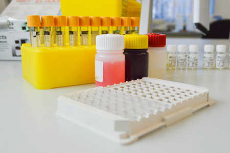 Chemical laboratory, reagents, solutions in flasks, salts in jars and powders in Petri dishes on a...