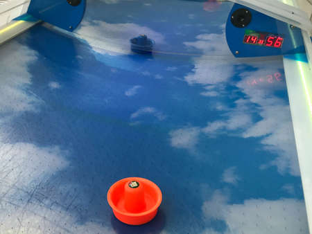 Air hockey table in the park outdoors.の写真素材