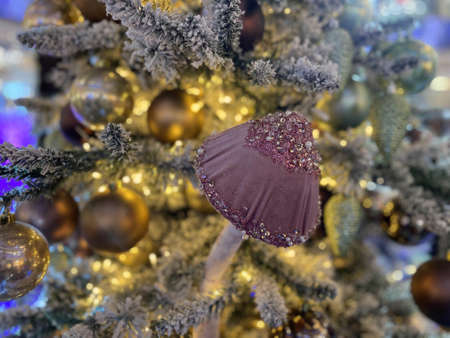 Happy New Year and Merry Christmas background with fir tree branches and toys and garlands. Holidays.の写真素材