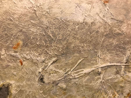 Old concrete wall with multicolor paint. Color panorama. Peeling, stones, cracks. Concept of colorful backdrop, background.の写真素材