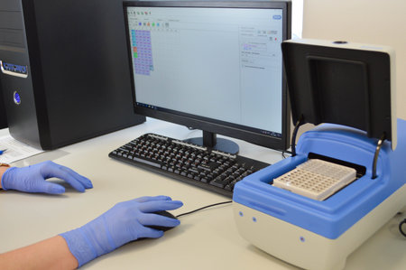 Female doctor working on computer.