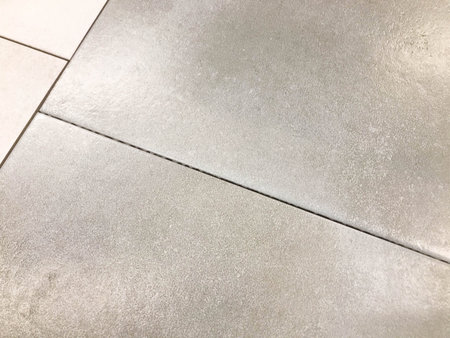 texture, floor and wall tiles. gray tiles with a concrete gap inside. single-colored natural stone...
