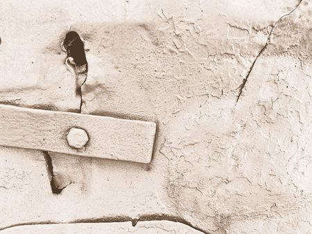 metal texture. homemade door. texture from painted metal sheet. background from bent metal with a hole. old material with door lock.の写真素材