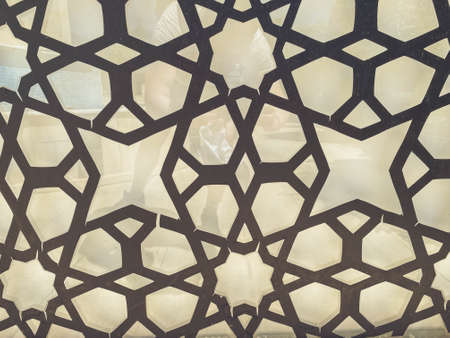 girl with rings on her fingers holding a white bag. flatley. bag and glasses in a car with leather seats. trendy and stylish look. fashion shooting.の写真素材