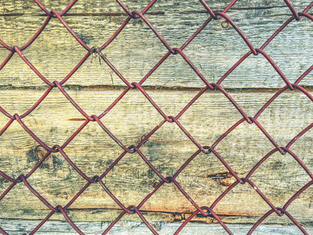 texture, background. natural, processed wood. the texture of the logs, the trees are behind a metal...