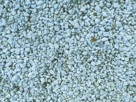 texture, background. small white stones. natural natural material. stones of even shape and uniform white color. volumetric texture.の写真素材