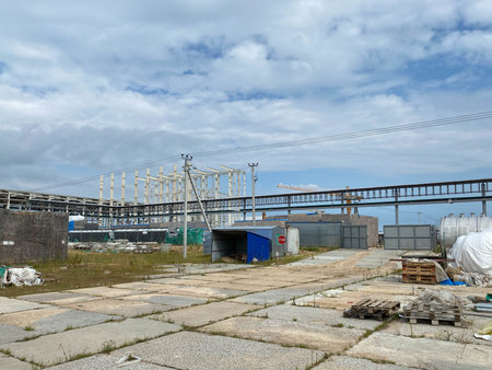 A large outdoor warehouse at a construction site, a warehouse for industrial equipment and materials...