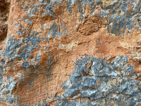 Background, texture, stone natural yellow red surface natural sharp convex rough cobblestone stone...