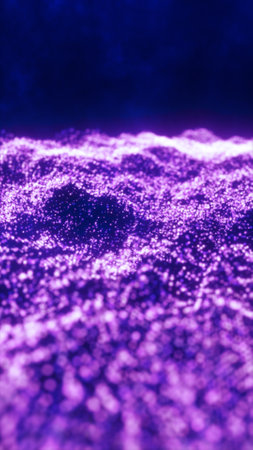 A mesmerizing field of tiny glowing purple particles forming a wave-like structure, representing energy flow and futuristic aesthetics.の写真素材