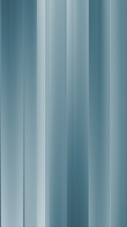 Minimalist light blue metallic vertical panels, ideal for modern backgrounds or industrial design backdrops.の写真素材