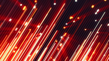 Abstract red and white glowing light trails moving diagonally on a dark background, creating a sense...