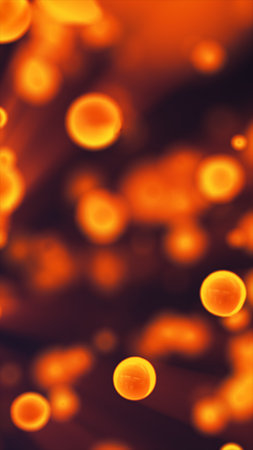 A dark golden cosmic background with glowing dots scattered throughout, creating a celestial and ethereal atmosphere.の写真素材