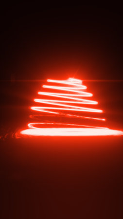 Abstract glowing red spiral in the shape of a light trail, resembling a futuristic Christmas tree.の写真素材