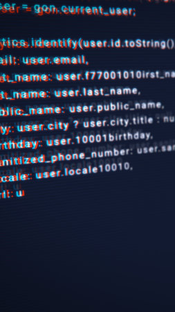 Abstract closeup of distorted digital programming code, cybersecurity and hacking concept.の写真素材