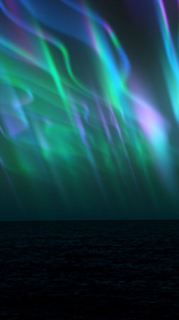 Abstract landscape of glowing green and purple aurora lights dancing over a dark ocean horizon at night.の写真素材