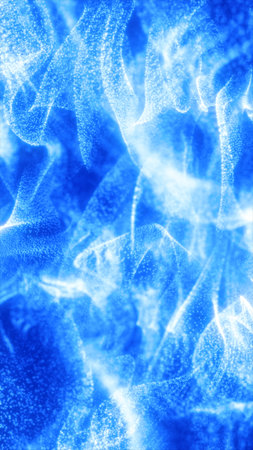 Abstract glowing blue particle waves forming fluid energy motion with a soft luminous texture.の写真素材