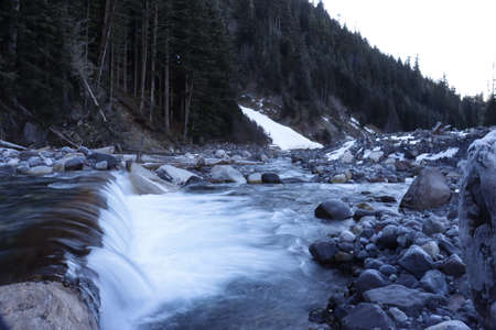 Crater falls trail at mt. Rainer national park. Small waterfall long exposureの写真素材