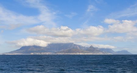 A view of Cape Town and Table Mountain from a boat in the bayの写真素材