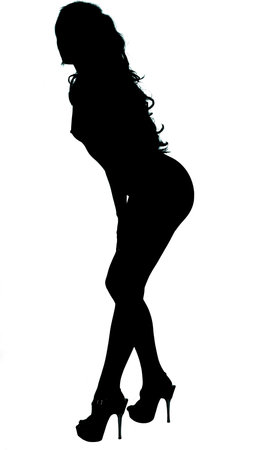 Beautiful  woman in high heels in silhouetteの写真素材